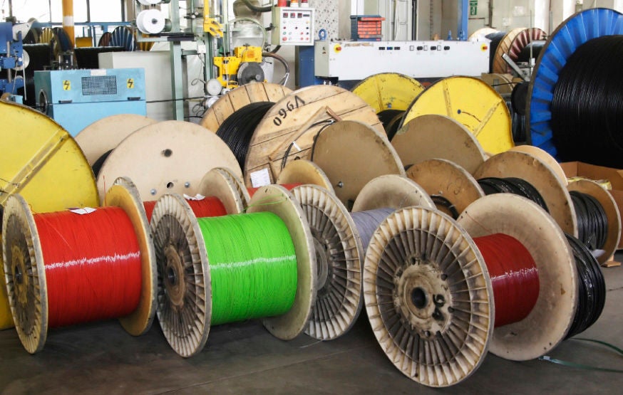 big spool of optic wire on a factory