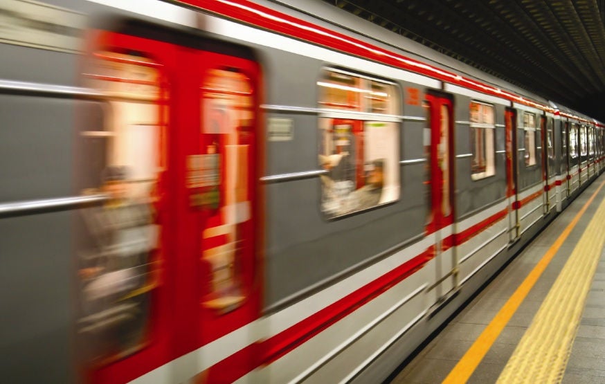 European metro transit vehicle in motion