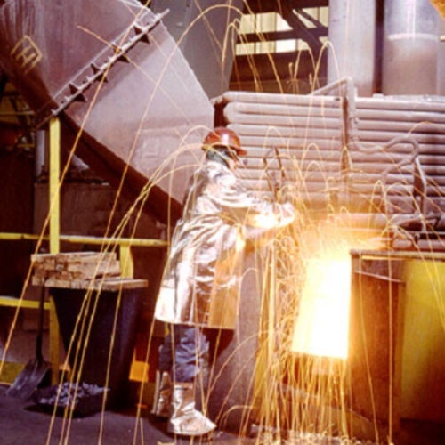 Person working in steel mill